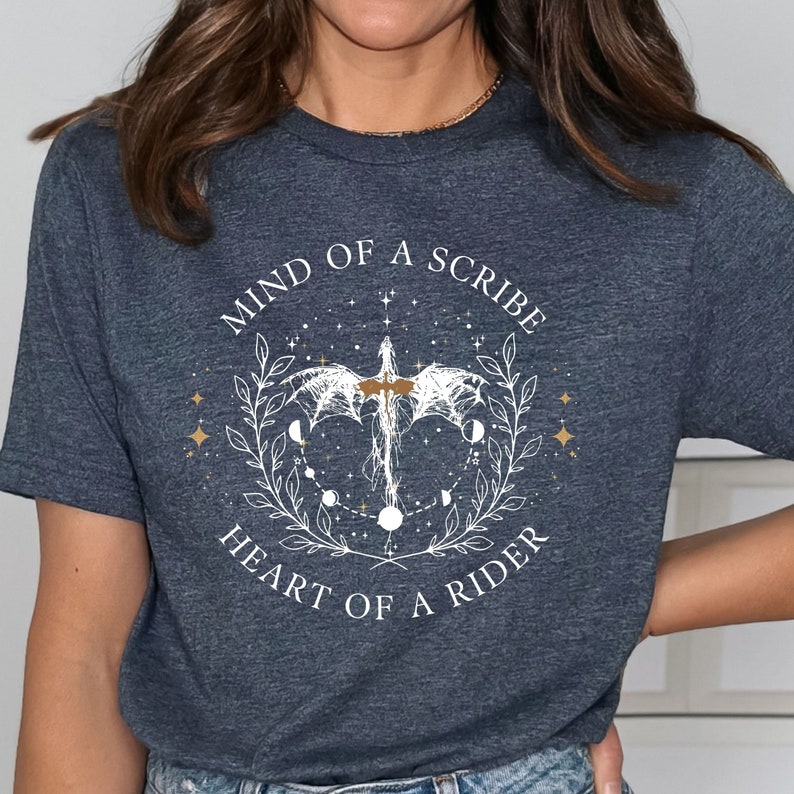 dragon rider shirt, Fourth Wing Mind of a Scribe, Heart of a Rider dragon shirt. Perfect for dragon riders and fantasy book enthusiasts, this Gildan 64000 tee combines comfort with the mythical allure of dragons. Ideal for dragon and fantasy readers.