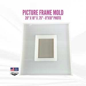 May include: White silicone mold for making a picture frame. The mold is 20 inches by 18 inches and is designed to hold an 8 inch by 10 inch photo.