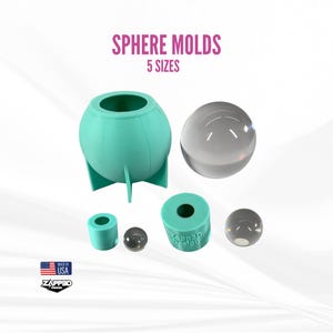 May include: A collection of sphere molds in various sizes. The image shows a teal mold, a clear sphere, and smaller teal cylinders with clear spheres. Text reads "SPHERE MOLDS 5 SIZES" and "MADE IN USA".