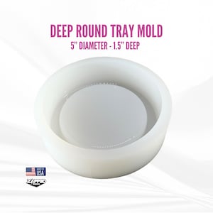 May include: A white, deep round tray mold with the text "DEEP ROUND TRAY MOLD" and "5" DIAMETER - 1.5" DEEP" in pink. The mold is 5 inches in diameter and 1.5 inches deep. The image also includes a "MADE IN USA" logo.