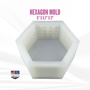 May include: White silicone hexagon mold for crafting. The mold is 5 inches by 5.7 inches by 3 inches.  Made in the USA. Zapped Design.
