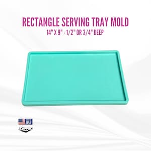 May include: A turquoise blue silicone mold for making rectangular serving trays. The mold is 14 inches by 9 inches and is either 1/2 inch or 3/4 inch deep. The mold is made in the USA.