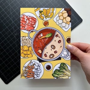 May include: A yellow illustration of a hot pot meal with a variety of ingredients, including meat, vegetables, noodles, and dumplings. The hot pot is surrounded by bowls of broth, sauces, and other ingredients.