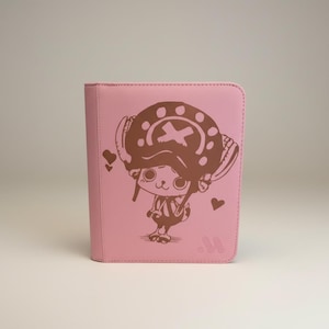 May include: A set of three ceramic mugs with a speckled, matte finish. The mugs are in shades of cream, light gray, and dark gray. Each mug has a simple, minimalist design and a rounded handle.