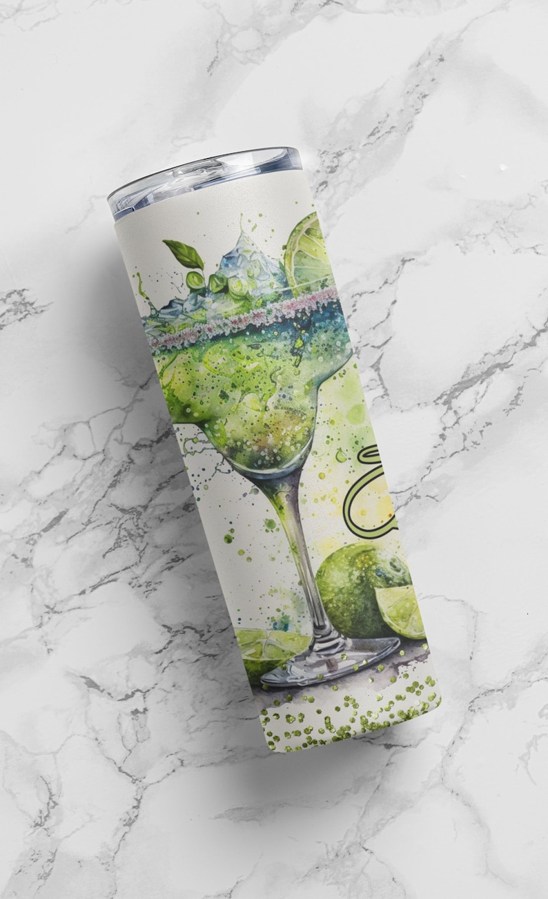 May include: A stainless steel tumbler with a watercolor design of a margarita glass with lime slices and green glitter.