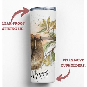 May include: White stainless steel tumbler with a watercolor illustration of a sloth hanging from a branch. The tumbler has a leak-proof sliding lid and says "Happy" at the bottom. It fits in most cupholders.