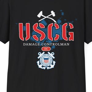 May include: Black t-shirt featuring the text "USCG DAMAGE CONTROLMAN" in red and white. The design includes a crossed hammer and wrench graphic above the text and a US Coast Guard emblem below. The shirt is a crew neck style.