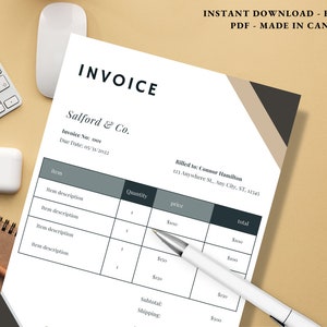 May include: A white invoice template with a modern design, featuring the text "INVOICE" and "Salford & Co." The document includes fields for item descriptions, quantities, and prices. A pen rests on the document, alongside a keyboard, mouse, and notepad.