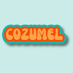 May include: A retro-style sticker with the word "COZUMEL" in orange letters with a teal outline.