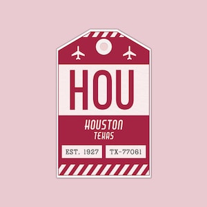 May include: Red and white luggage tag with the text "HOU" and "HOUSTON TEXAS" in white. The tag also has the text "EST. 1927" and "TX-77061" in white.