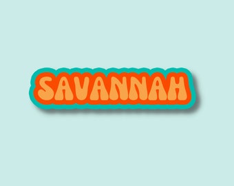 May include: A sticker with the word "SAVANNAH" in orange letters with a teal outline.