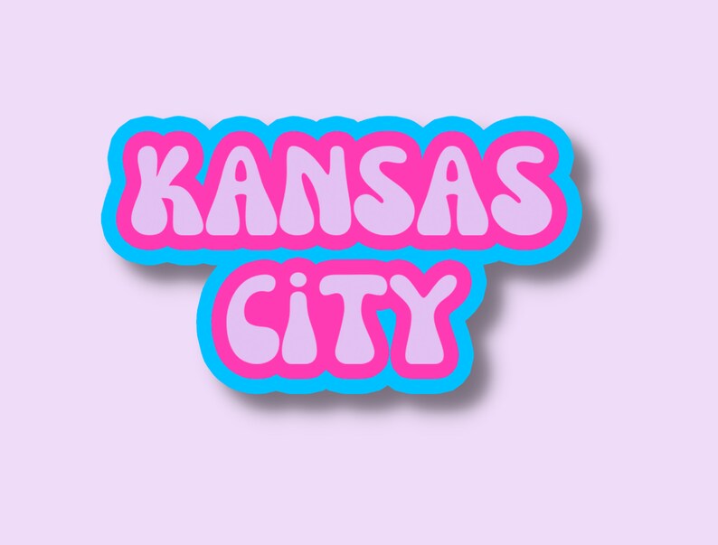 May include: A blue and pink retro-style graphic with the text "KANSAS CITY" in bubble letters.