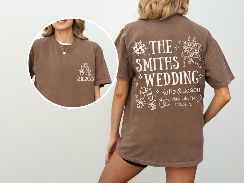 a woman wearing a brown t-shirt with white text and graphics on the back.