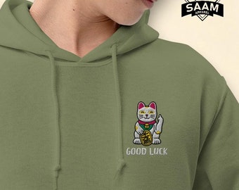 Sudadera unisex con capucha y bolsillos bordada con diseño de gato de la suerte y el dinero Maneki-Neko de dedo medio
