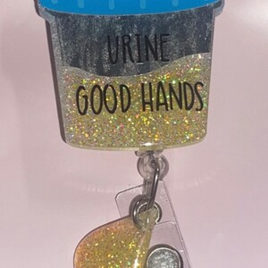 Urine cup and droplet Urine Good Hands badge reel nurse lab tech