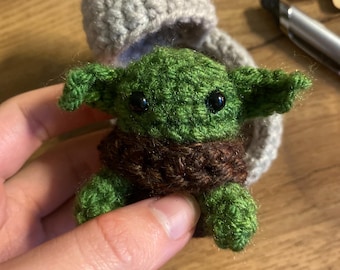 Green Baby Alien and Starship