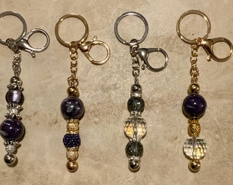 Beautiful keychains she’ll love! 360 deg swivel ring w/clasps in gold or silver. Custom orders available!!