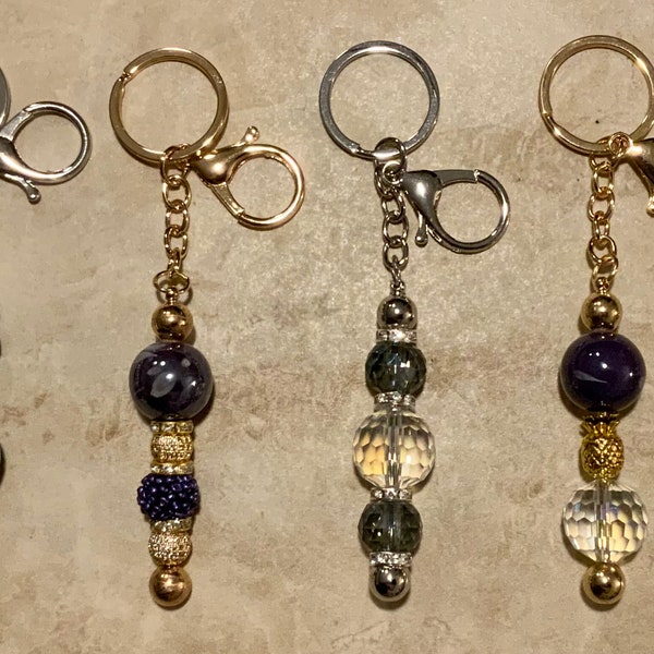 Beautiful keychains she’ll love! 360 deg swivel ring w/clasps in gold or silver. Custom orders available!!