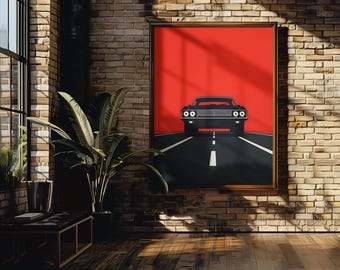 May include: A framed poster with a black car driving down a road against a red background.