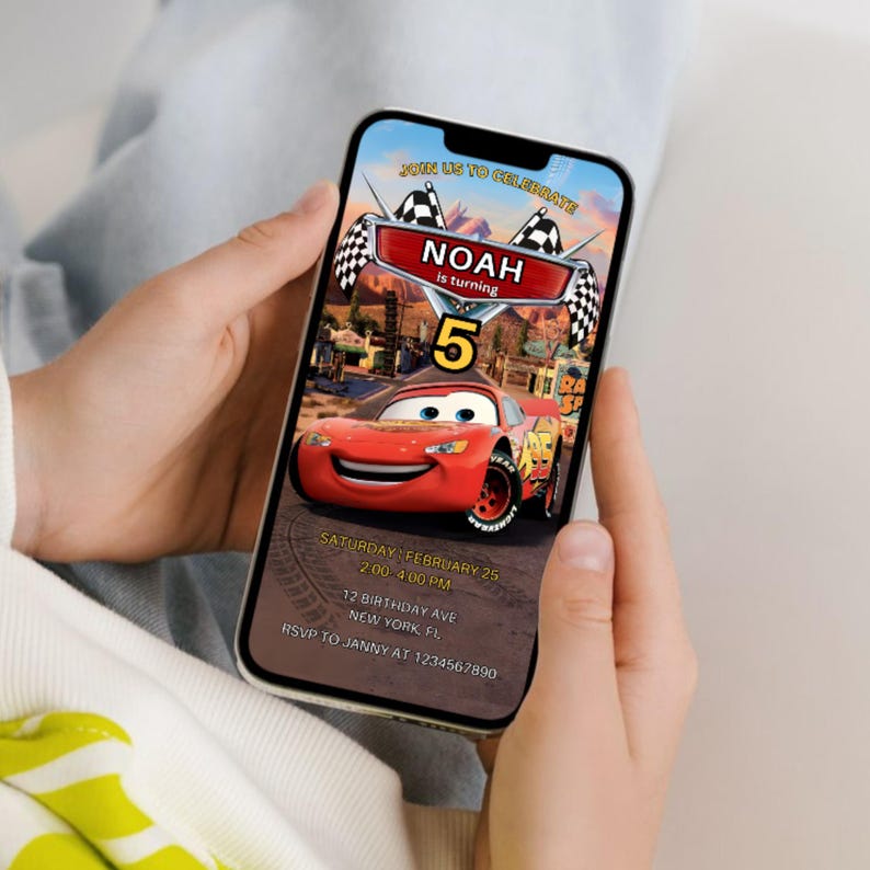 May include: A smartphone displays a birthday invitation featuring a red cartoon race car. The invitation reads "NOAH is turning 5" with event details: Saturday, February 25, 2:00-4:00 PM, 12 Birthday Ave, New York, FL. RSVP to Janny at 1234567890.