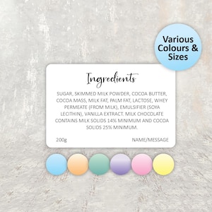 May include: A white card with the word "Ingredients" in elegant script, listing ingredients for a product. The card includes a weight of 200g and space for a name or message. A blue circle with "Various Colours & Sizes" is in the top right.