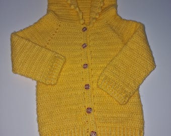 Handmade, crocheted baby jacket
