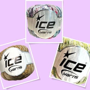 May include: Three balls of yarn with a silver label that reads "Ice Yarns" and a star. The yarn is in different colours: a multi-coloured ball, a gold ball, and a green ball.
