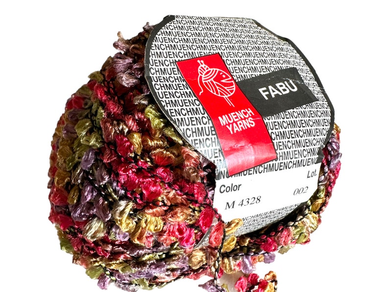 May include: A skein of multi-coloured yarn with a label that reads "FABU" and "MUENCH YARNS". The label also includes the colour code "M 4328" and the lot number "002".