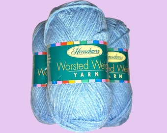 May include: Three skeins of blue worsted weight yarn, labeled "Herschners Worsted Weight Yarn".
