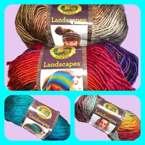 May include: Four skeins of Lion Brand Landscapes yarn in different color combinations. The yarn is a gradient style with shades of brown, red, teal, and purple.