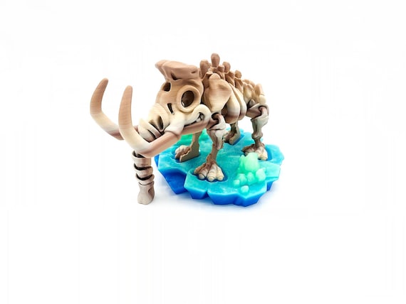 A fully articulated, poseable mammoth skeleton desk pet — every joint actually moves, it's eco-printed, and it's the kind of thing that lives on your desk and sparks conversation for years.