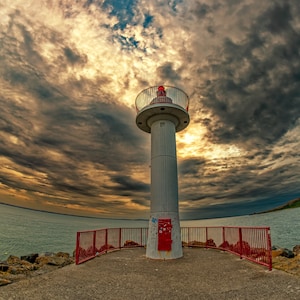 Lighthouse in sunset through fisheye lens