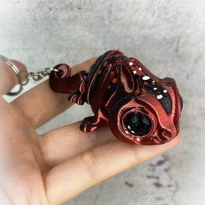 Schlüsselanhänger Chamäleon rot schwarz