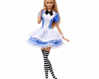 May include: A blonde doll with long hair wearing a blue dress with a white apron, a black bow at the neckline, and white lace trim. The doll is also wearing black and white horizontally striped stockings and small stud earrings on its ears.