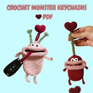 May include: Crochet monster keychains in pink and red, each with a heart accent. One keychain holds a car key. The image includes the text "CROCHET MONSTER KEYCHAINS PDF".