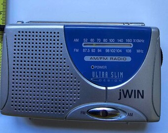 JWIN Ultra Slim AM/FM Pocket Radio