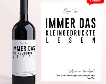 May include: A bottle of red wine with a white label that says "Immer das Kleingedruckte lesen" which translates to "Always read the fine print". The label also includes the text "Willst du mein Patenonkel sein?" which translates to "Do you want to be my godfather?" and "Denn du bist jemand ganz besonderes für mich!" which translates to "Because you are someone very special to me!"