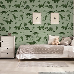 Green Dinosaur removable peel and stick wallpaper in a little boys room.
