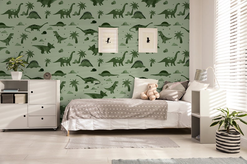 Green Dinosaur removable peel and stick wallpaper in a little boys room.