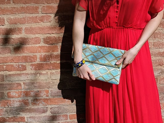 Large blue clutch bag hot sale