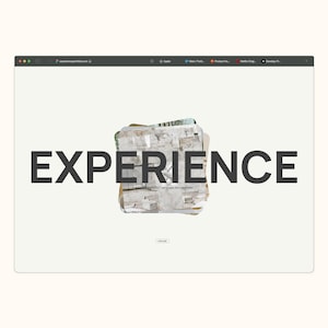 May include: A website homepage with the word "EXPERIENCE" in large, bold, black letters. The background is white and there is a stack of papers in the centre of the screen.