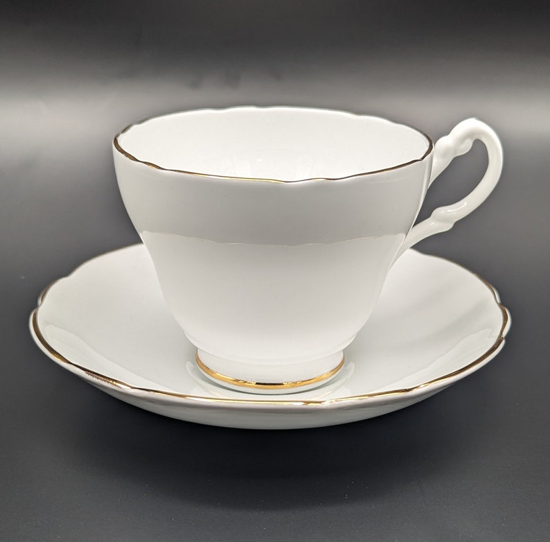 Elegant Regency Bone China Tea Cup and Saucer Set Pure White With Gold