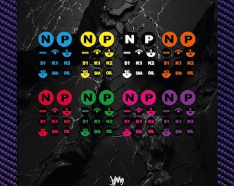 May include: A collection of circular adhesive decals featuring the letters N and P, along with smaller labels marked DRINK, RADIO, 1, S1, K1, K2, 10, SHA, and OIL. These stickers are presented in eight distinct colors: blue, yellow, white, orange, red, green, pink, and purple.