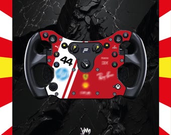 May include: A racing wheel in red, white, and black, featuring the number 44 and multiple buttons and logos. The wheel has a black grip and is set against a dark, textured background.