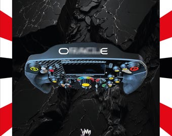 May include: A black racing steering wheel controller featuring a carbon fibre texture, a central digital display, and various multi-coloured buttons and rotary dials. The word ORACLE is printed in white on the top edge of the steering wheel housing.