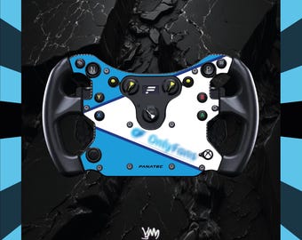 May include: A black and blue racing wheel with white and blue accents. The wheel has buttons and a central control panel. The text "OnlyFans" is visible on the wheel, along with the brand name "FANATEC".