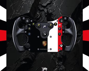 May include: A racing wheel in black and white with red and white detailing. The wheel features buttons, dials, and a Porsche emblem. Set against a black marble effect background with a red and white chequered border.