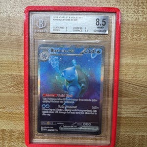 does beckett grade pokemon cards Graded: #06 Charizard Topps Chrome (2000) 9.5  Double Infinity Gaming I Re-Graded my Pokmon Cards