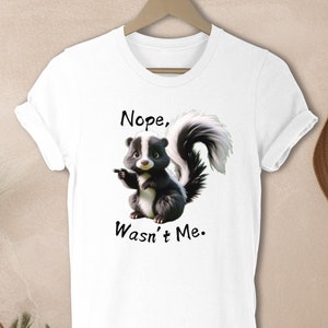 Cute skunk shirt, Funny skunk t-shirt, Adorable skunk design, Skunk graphic tee, Skunk-themed clothing, Skunk lover gift, Skunk humor shirt