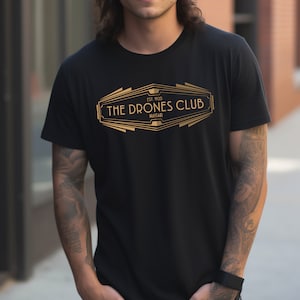 Wooster The Drones Club Unisex T-Shirt | Wodehouse Shirt | Jeeves | Art Deco Style | Gold Drones Club Logo | Bertie&#39;s Gentleman&#39;s Club Tee